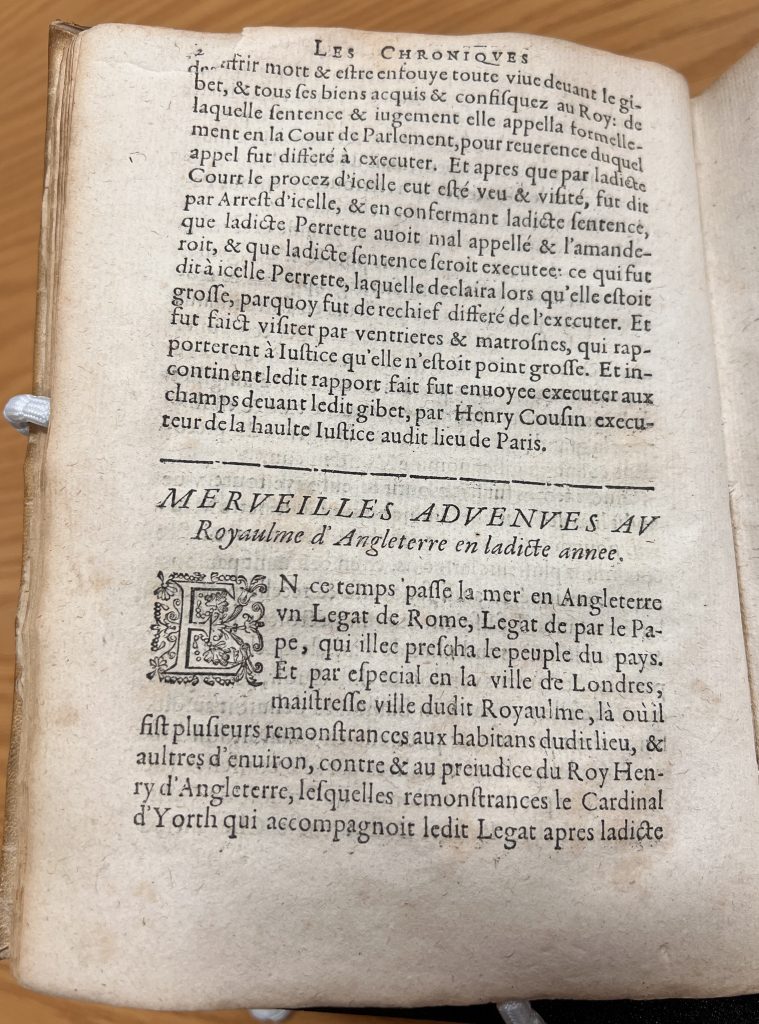 An image of Page 4 of the copy showcasing a rip in the top left corner of the page.