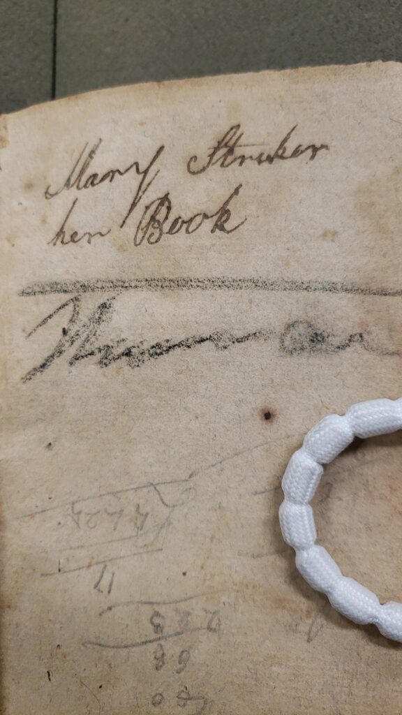 Text: Mary Striker, her book; and, Thomas